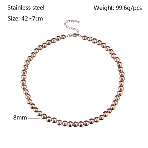 Polished rose gold stainless steel 8mm bead necklace with an adjustable link chain