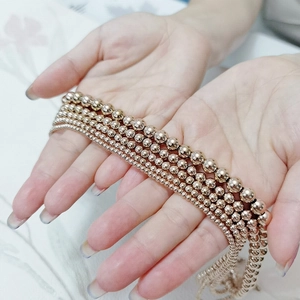 Detailed comparison of five different sizes of polished rose gold stainless steel bead necklaces