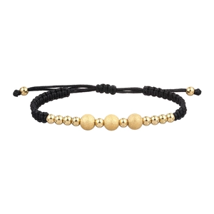 Detail of adjustable black woven bracelet featuring matte and polished gold beads