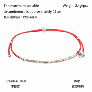 Detail of red woven cord bracelet showing PVD plated stainless steel beads and 26cm adjustable length