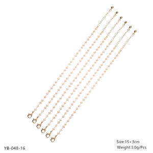 Set of six gold beaded bracelets with light pink crystals and adjustable chain