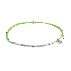 Close-up of green woven cord bracelet featuring silver beads and engraved S.Steel tag