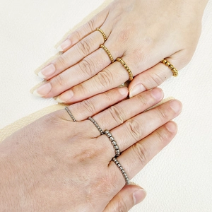 Elastic stainless steel beaded rings for couples in gold and silver finish
