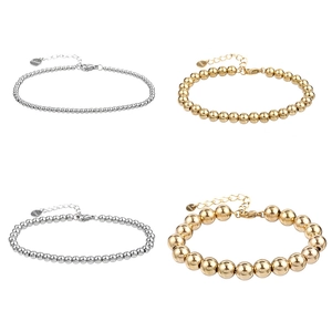 Détails de bracelets à perles en acier inoxydable doré et argenté avec fermoir mousqueton