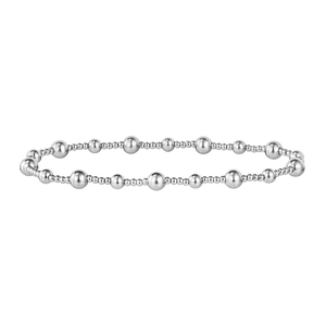 Detail of polished stainless steel beaded bracelet with alternating round metal beads