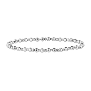Detailed view of polished silver stainless steel beaded bracelet with alternating sphere sizes