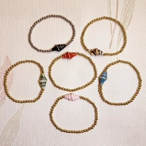 Waterproof ocean theme bracelet set with ceramic sea shell charms and steel beads