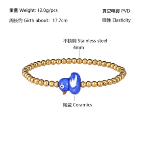 Detail of stainless steel bead bracelet with blue ceramic duck charm and 17.7cm circumference