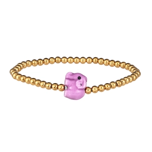 Close-up of golden metal beads bracelet featuring a cute pink ceramic elephant charm