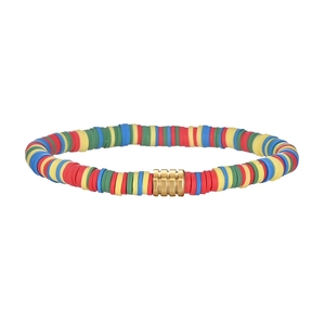Detailed macro view of colorful bohemian Heishi bead bracelet with a gold metal spacer