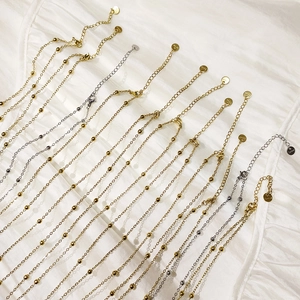 Minimalist beach style beaded chain necklaces in gold and silver finishes for women
