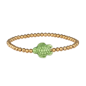 Detail of waterproof stainless steel gold beaded bracelet with a green ceramic turtle charm