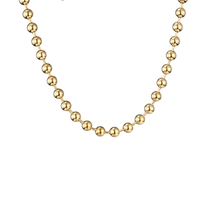 Detailed close-up of polished golden bead ball chain necklace with high mirror finish
