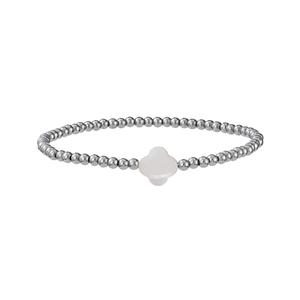 Detailed shot of silver beaded bracelet with a white mother of pearl clover pendant