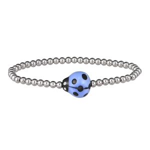 Macro detail of stainless steel beaded bracelet featuring a light blue ceramic ladybug charm