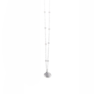 Macro view of silver shell pendant with detailed line texture and beaded chain