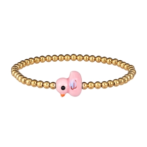 Detail of beaded bracelet with gold stainless steel balls and pink ceramic duck pendant