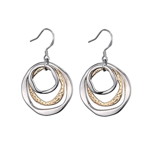 Detail of 925 stamp on tricolor interlocking hoop earrings with hammered texture