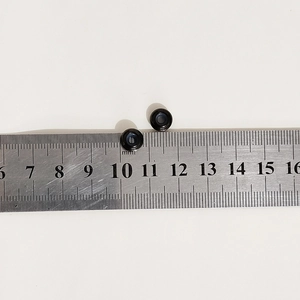 Detail view of 10mm black waterproof silicone stoppers for stretch bead bracelets