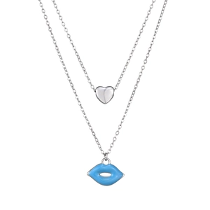Detail of double-layer necklace with mini heart and blue enamel lip pendant charm