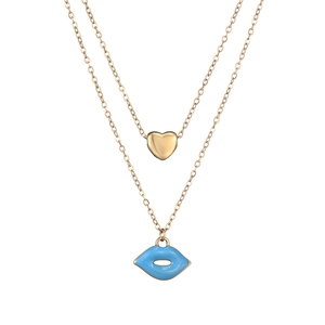 Detail of layered gold necklace featuring a blue enamel lip and heart pendant charms