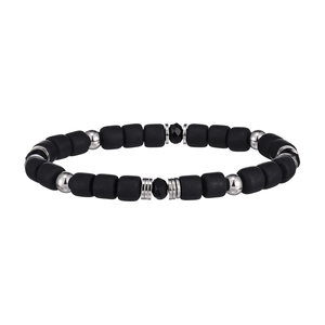 Detailed view of matte black cylindrical beads and polished silver accent spheres on the bracelet
