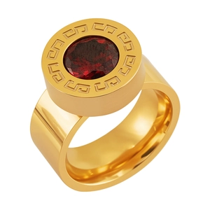 Detail of gold-plated stainless steel ring with red zircon and Greek meander pattern