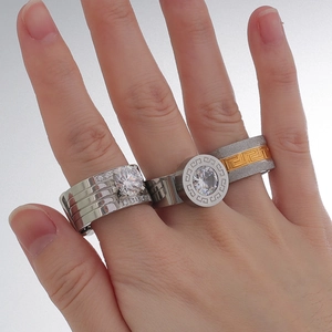 Elegant wide silver and gold plated steel ring set with Greek fret pattern and diamonds