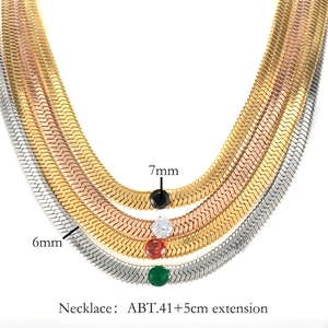 Snake bone chain necklace set with colorful round gemstones in gold, silver and rose gold