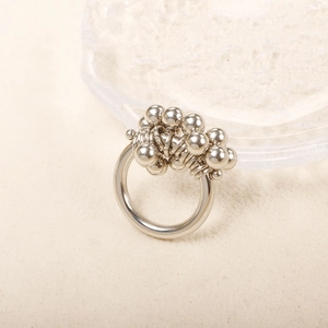 Minimalistische zilveren roestvrijstalen ring met 18K vergulde onregelmatige metalen kralen