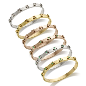 Star patterned 18k plated titanium steel bangles set with crystals in three metal colors