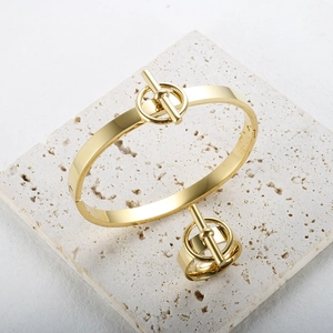 Ensemble de Bijoux de Mode en Acier Inoxydable pour Femme Plaqué Or Avec Fermoir Cabillot Bracelet et Bague Assortis