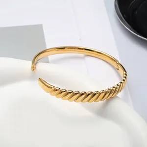 Minimalist twisted and smooth gold stainless steel hinged bangle for women and men