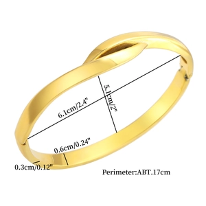 Twisted gold titanium steel bangle for women showing precise dimensions 6.1cm by 5.1cm