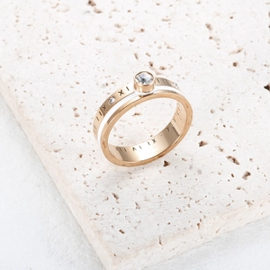 Titanium steel Roman numeral ring with white enamel and center crystal in gold finish