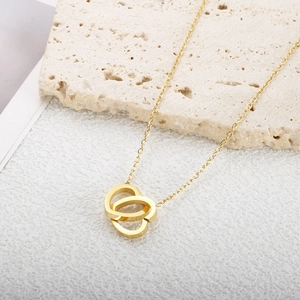 Polished 18K gold-plated titanium steel necklace featuring interlocking heart pendants