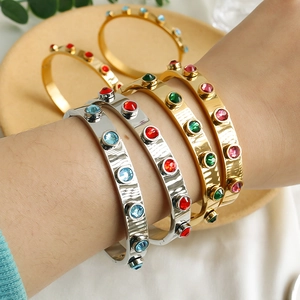 Luxe roestvrijstalen open armband met kleurrijke ronde zirkonia in goud en zilver