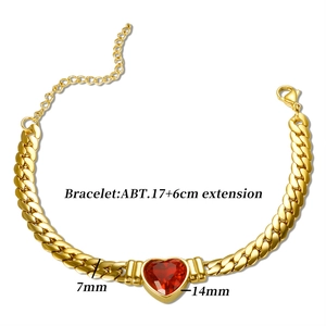 Detail of gold Cuban chain bracelet featuring a red heart zircon with size measurements