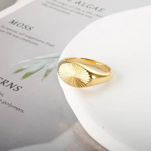 Elegant 18K gold plated stainless steel oval signet ring with sunburst pattern