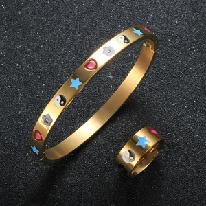 Gold stainless steel jewelry set with colorful enamel hearts stars and yin yang symbols