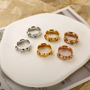 Star shaped titanium steel rings with green and white zircon in gold and silver finishes