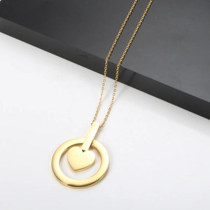 Collier minimaliste en acier inoxydable doré 18K avec pendentif cœur ajouré