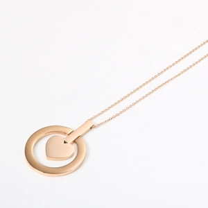 Collier élégant en or rose 18K avec pendentif cœur creux et cercle au design minimaliste