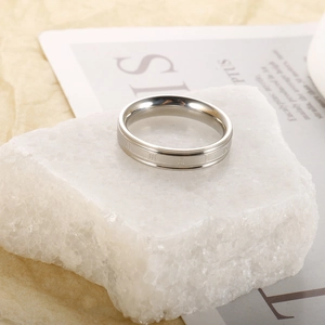 Silver stainless steel ring with Roman numerals on crystal stone background