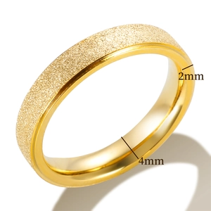 Close-up of 4mm gold frosted stainless steel ring showing 2mm thickness dimensions