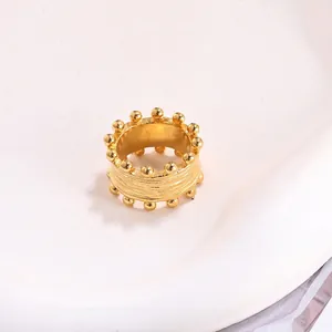 Vintage golden crown ring with textured inner band and beaded edges for women
