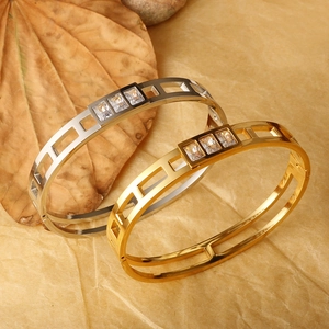 Minimalist gold and silver hollowed-out titanium steel bracelets with cubic zirconia
