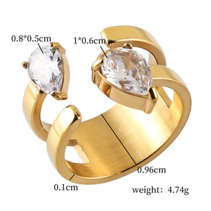 Detail view of adjustable gold stainless steel ring with pear-cut cubic zirconia stones