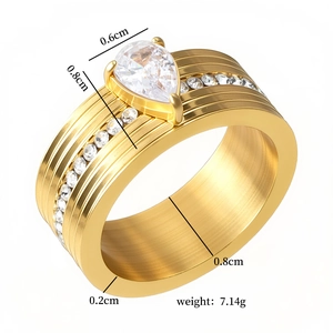 Brushed gold stainless steel wide ring with pear-cut stone and zircon inlay details