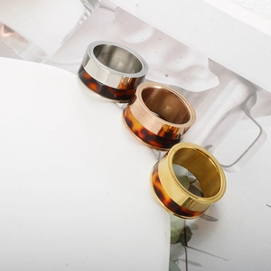 Three-piece stackable tortoise shell titanium steel rings in gold, silver, and rose gold